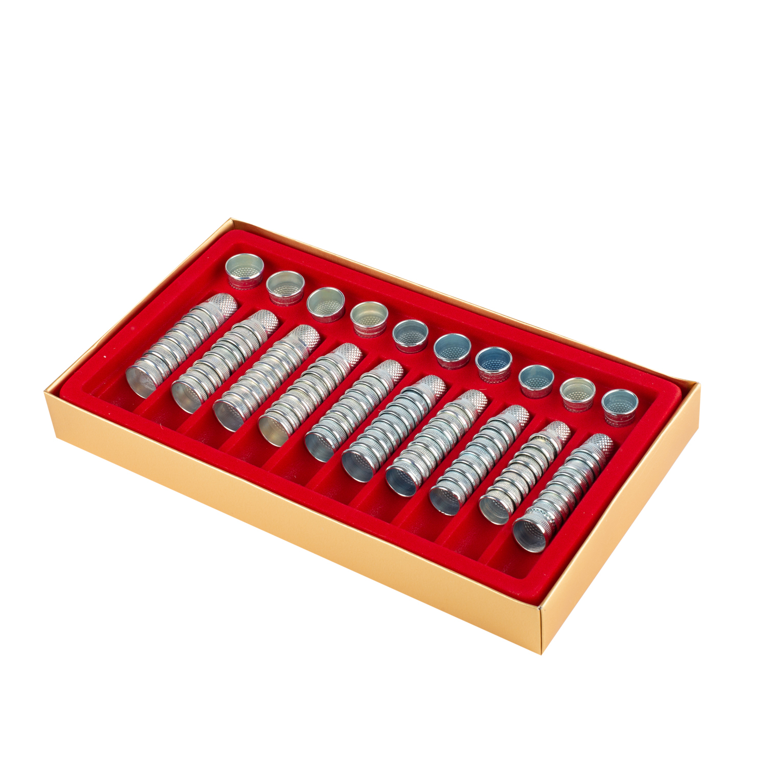 Assortiment de dés à coudre sur plateau en suédine
