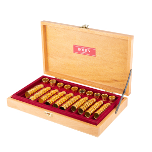 Assortiment de dés à coudre dans son coffret en bois